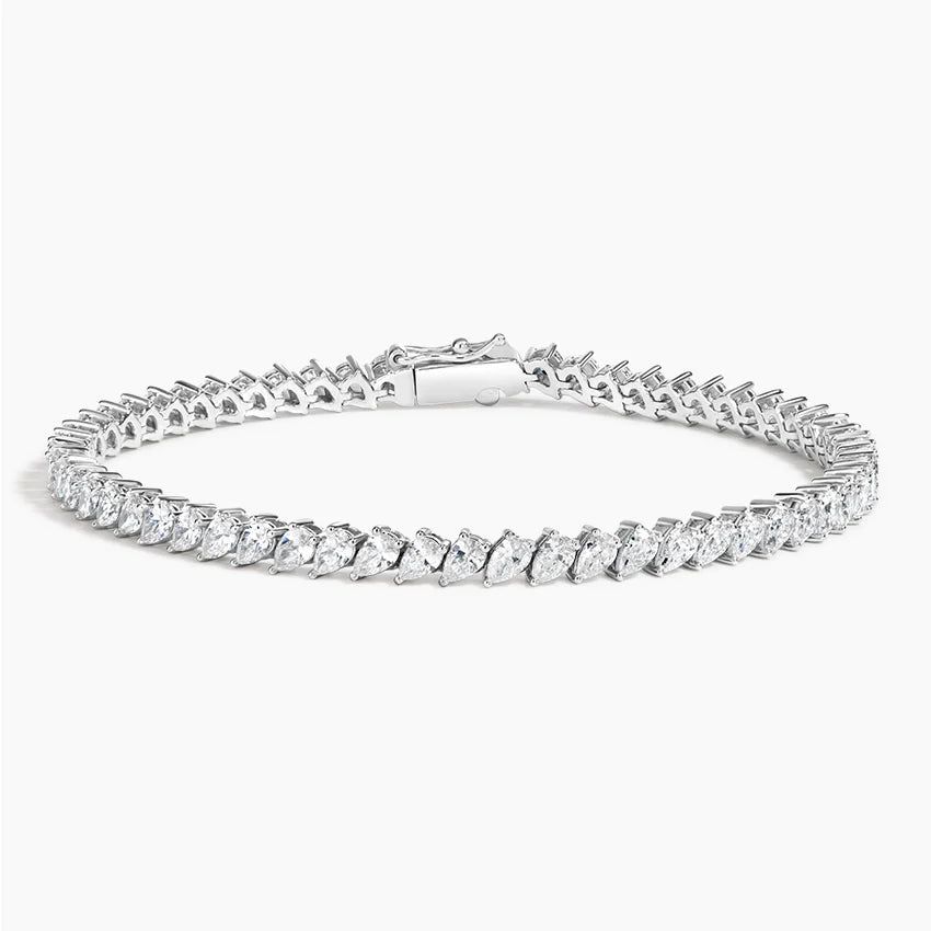 Тенісний браслет з діамантами Angled Pear Cut
