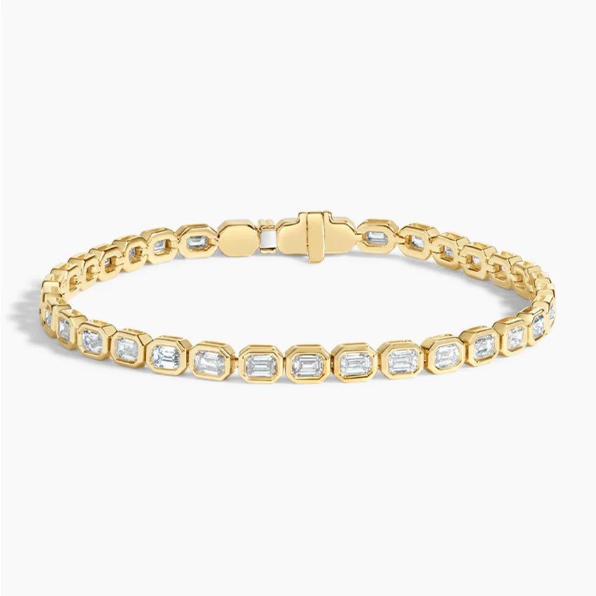 Тенісний браслет з діамантами Bezel Emerald Cut