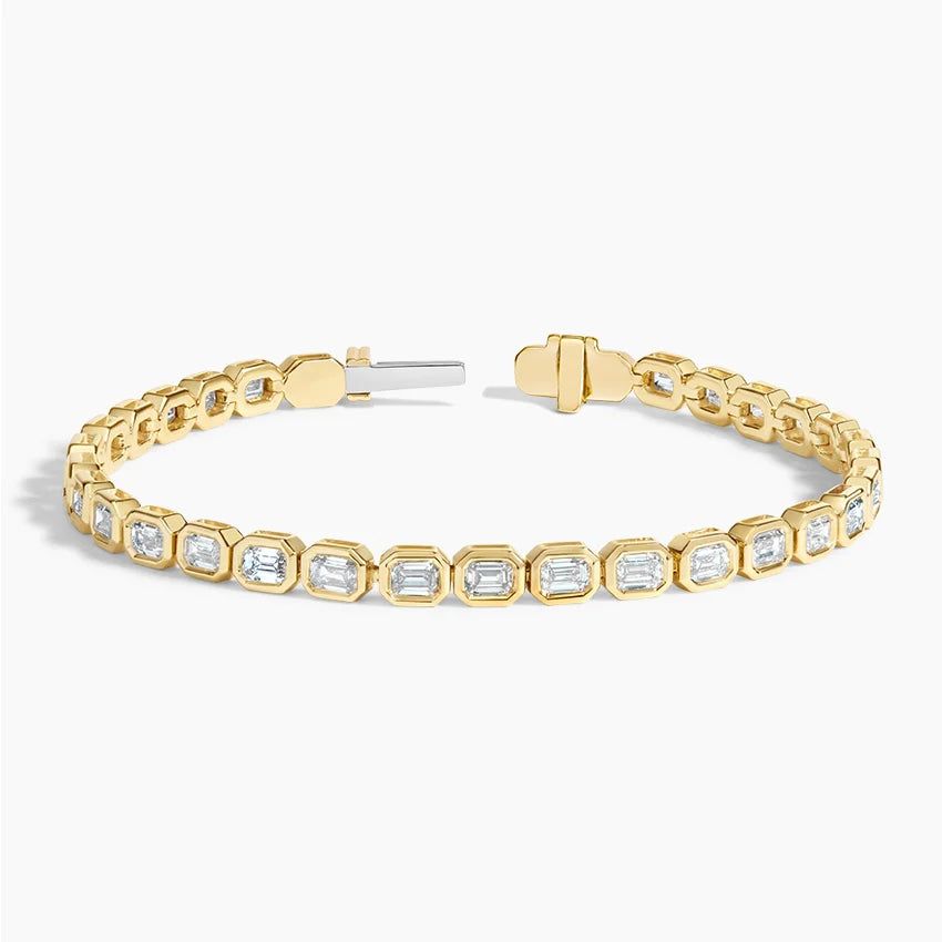 Тенісний браслет з діамантами Bezel Emerald Cut